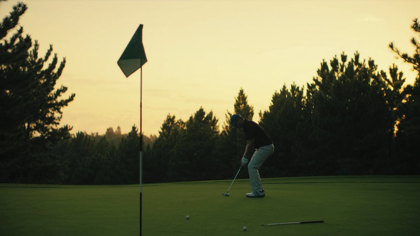 Reading a putt at dusk